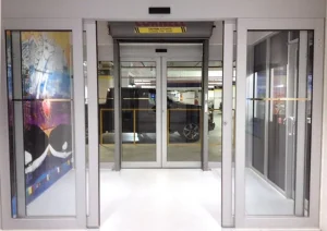 CDA automatic sliding doors equipped with smart sensors in action, enhancing safety and accessibility in a commercial space.